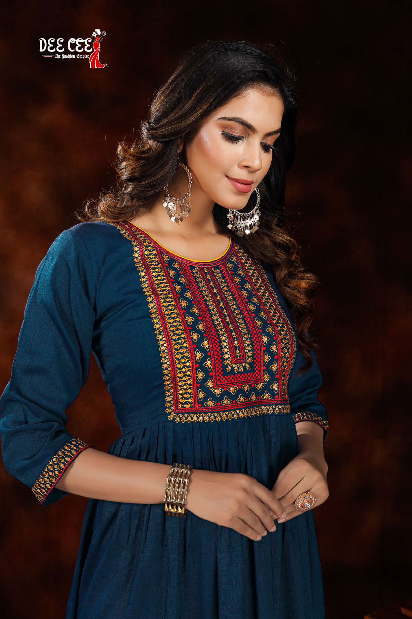 Dee Cee Orange Rayon Fancy Wear Designer Latest Kurtis Collection